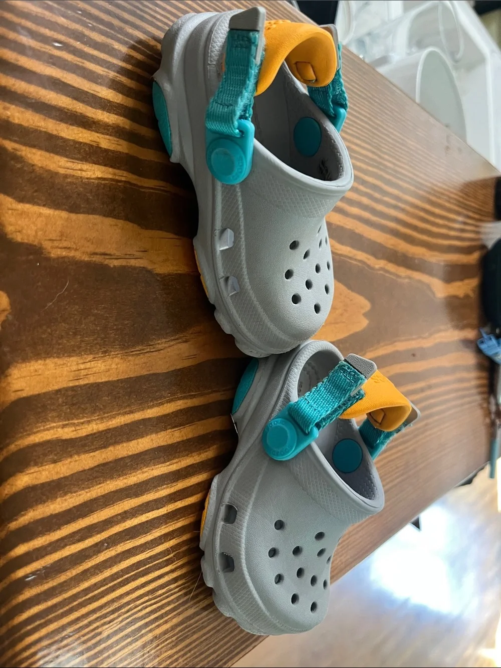 CROCS Kids Clogs with Teal and Yellow Accents